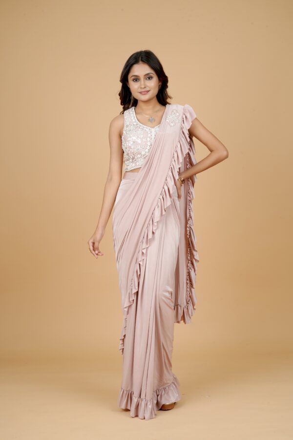 Peach Ruffle Saree with Embroidered Blouse